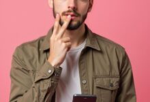 ai generated, man, curious, confused, boy, fear, handsome, smart, smartphone, phone, technology, realistic